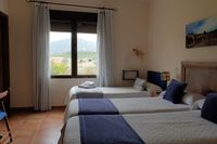 Dormitorio de Mirador de la Fuente con vistas a Cabañeros