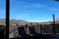 Parque Nacional de Cabañeros visto desde la piscina de Mirador de la Fuente. Parque Nacional de Cabañeros visto desde la piscina de Mirador de la Fuente.